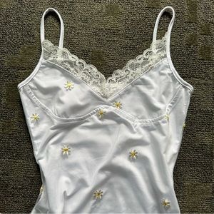 white mini dress with daisies